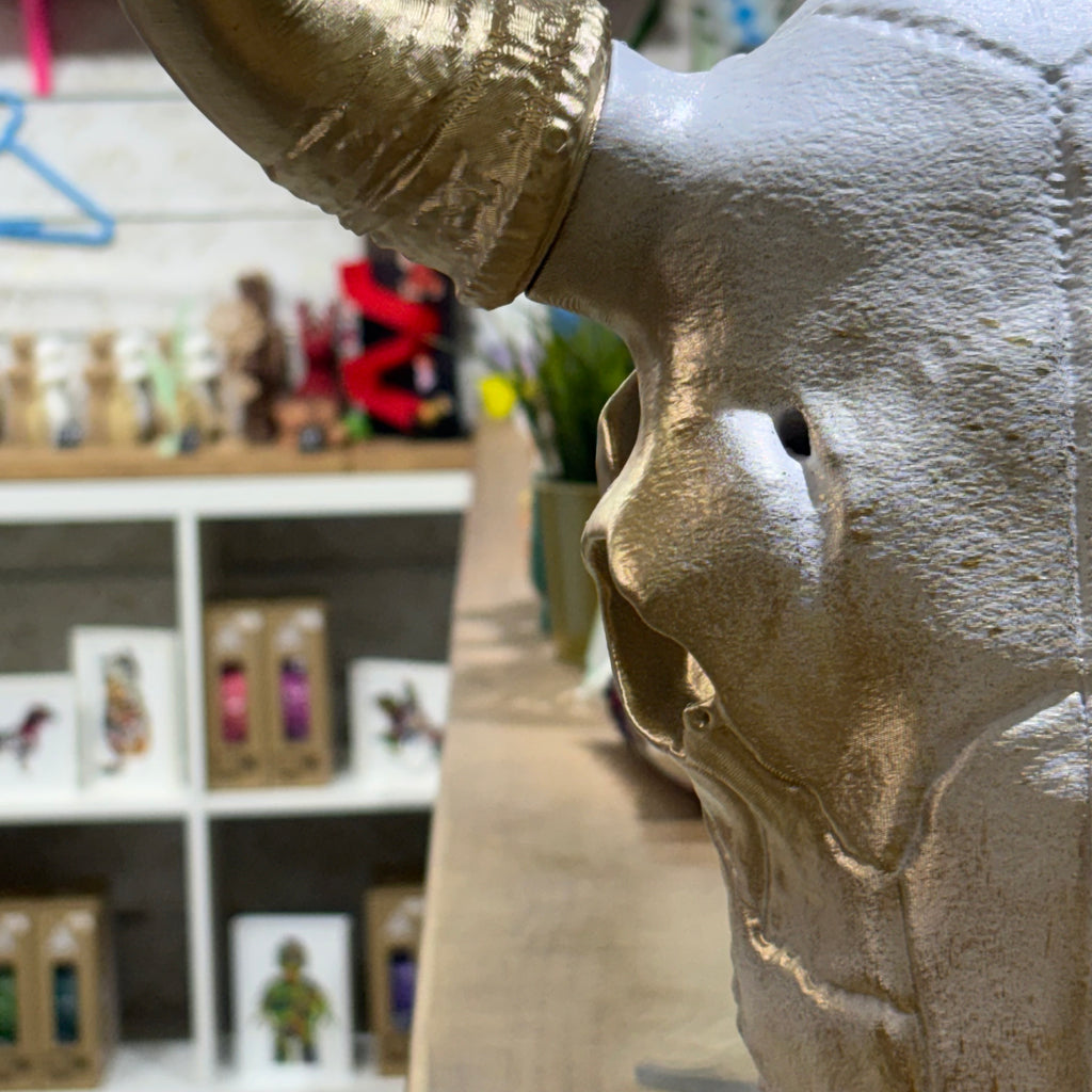 CRANEO VACA DECORADO DORADO