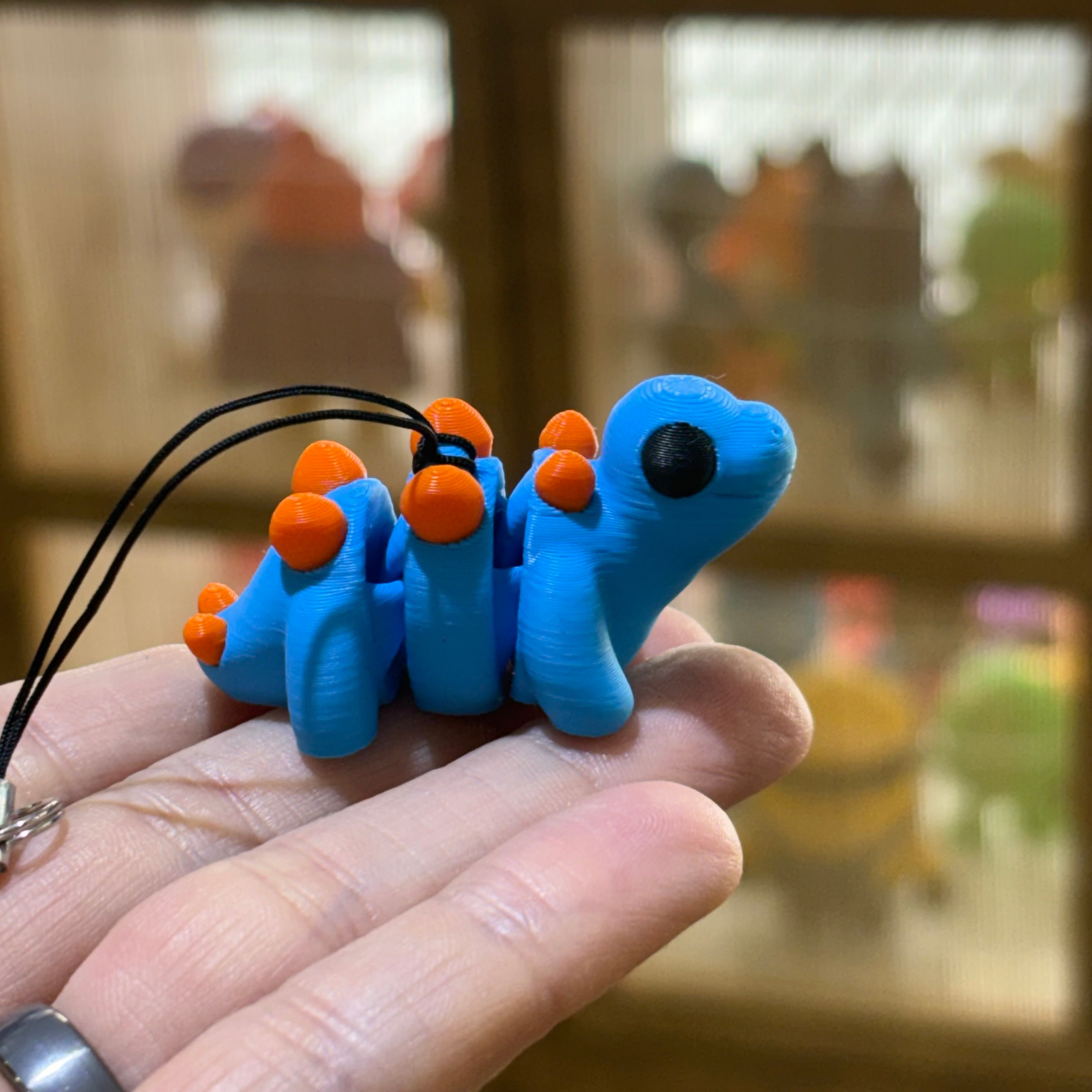 LLAVERO MINI STEGOSAURUS FLEXI AZUL