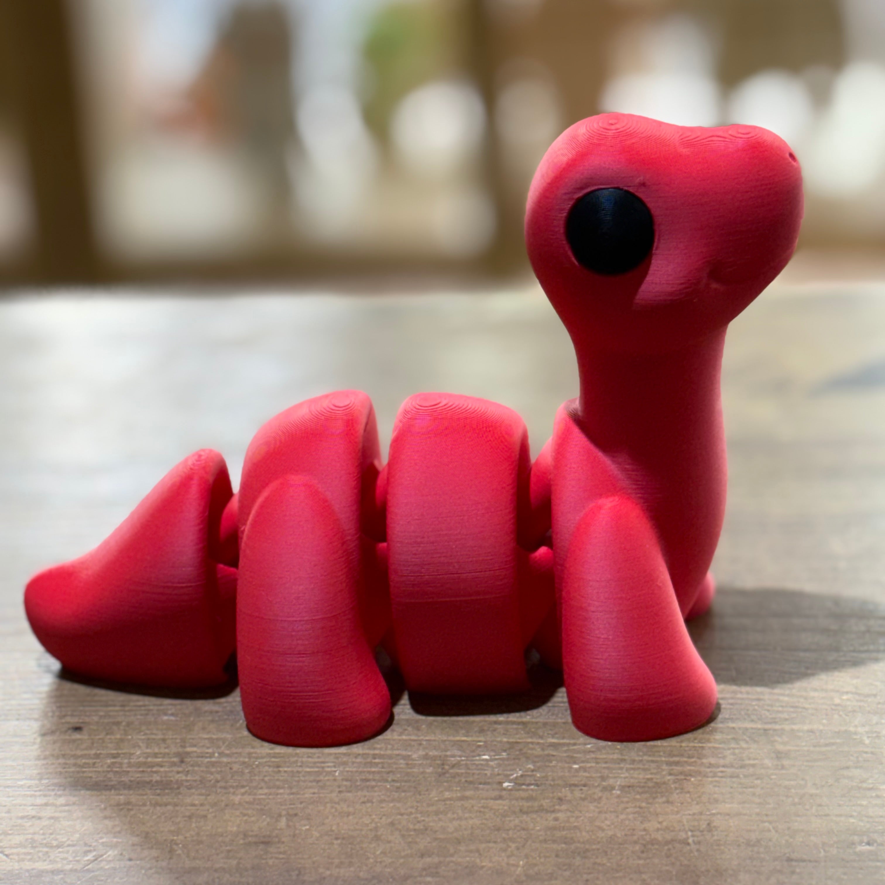 MAXI BRONTOSAURUS FLEXI ROJO